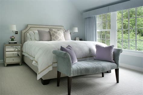 Blue Bedroom With Beige Bed And Mirrored Nightstands Transitional