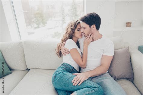 Portrait Of Sexy Romantic Couple In Casual Denim Clothes Cuddling