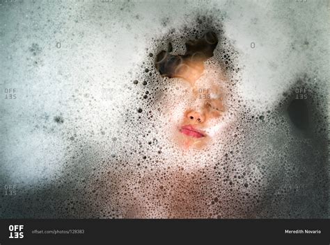 A Girls Face Underwater In A Bathtub Stock Photo Offset