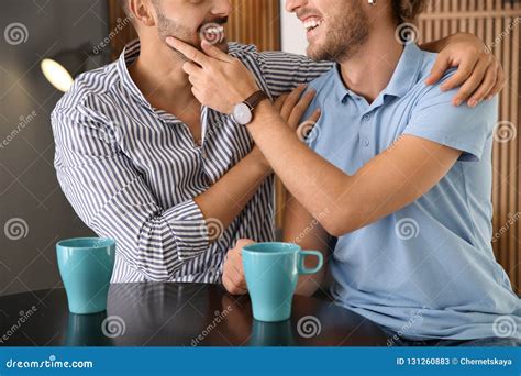 Happy Gay Couple With Coffee At Table Indoors Stock Image Image Of Liberty Cafe 131260883