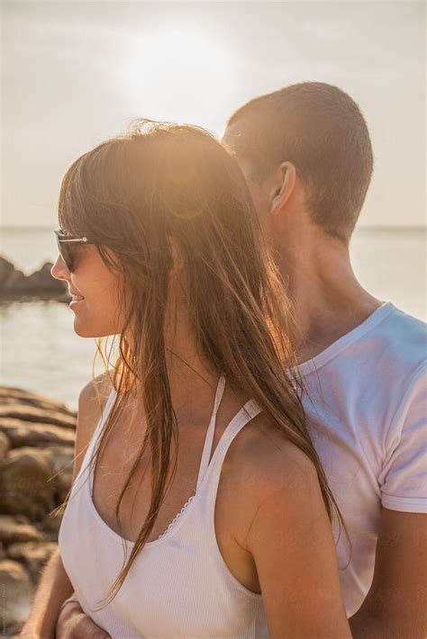 Couple At The Beach At Sunset Del Colaborador De Stocksy Mosuno Stocksy