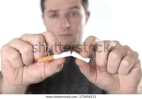 Young Attractive Man Breaking Cigarette Isolated Stock Photo 172696211
