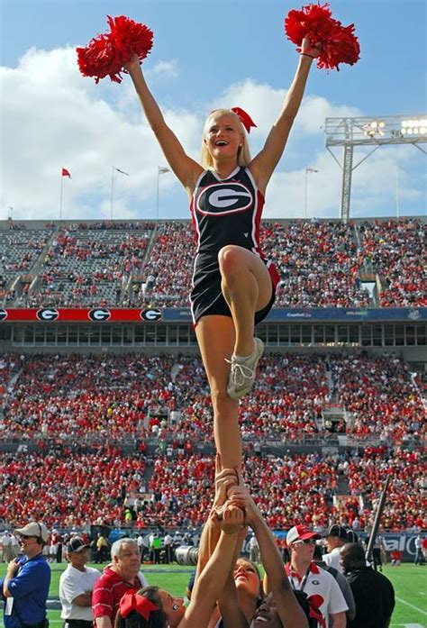 Georgia Cheerleader Supporting The Uga Dawgs Football Team At Sanford Stadium On The Campus Of