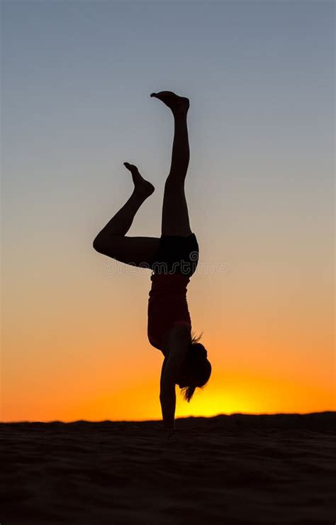 Woman Doing Handstand Beach Stock Photos Download 150 Royalty Free Photos