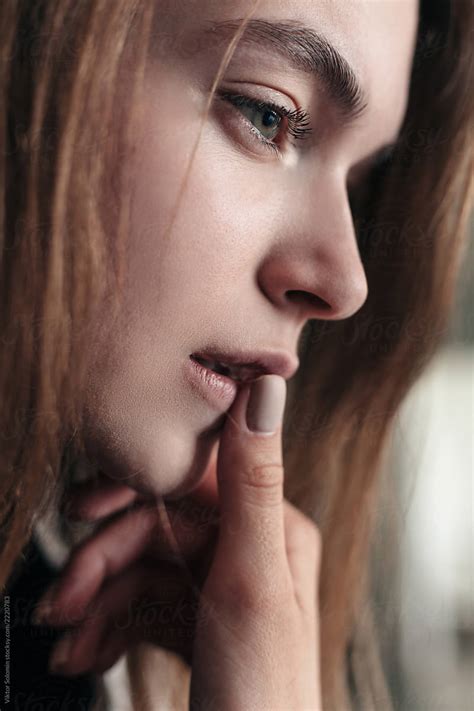 Closeup Side Portrait Of Sad Womans Face By Stocksy Contributor Viktor Solomin Stocksy