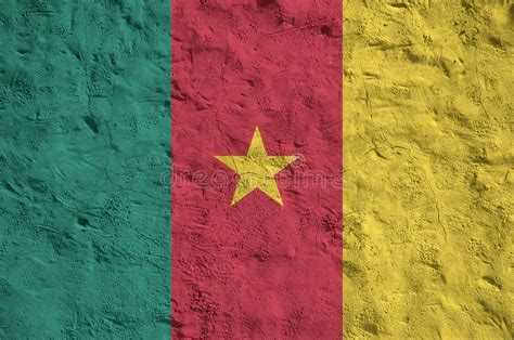 Cameroon Flag Depicted In Bright Paint Colors On Old Relief Plastering