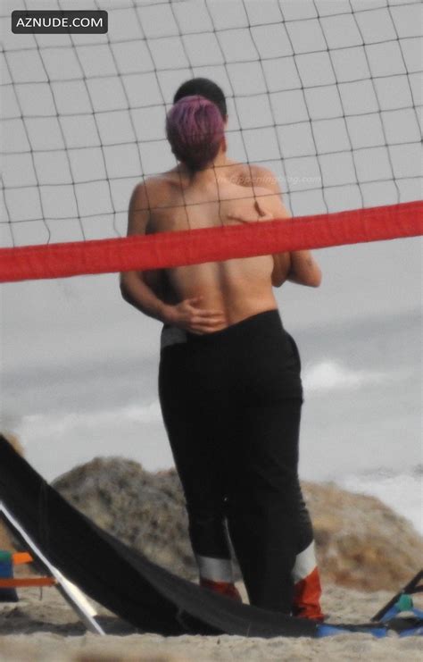 Megan Rapinoe And Sue Bird During A Romantic Photoshoot On The Beach In
