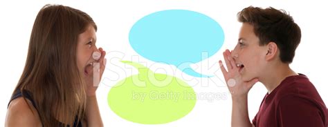 Young Children Talking With Speech Bubble And Copyspace Stock Photo