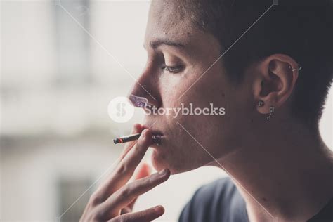 Young Lesbian Stylish Hair Style Woman Smoking At Home Royalty Free Stock Image Storyblocks