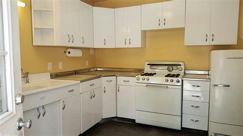 To ensure a flush fit between this unit and its neighbor, join the two with a clamp. Youngstown metal cabinets- sanded and painted Rustoleum Gloss white. This kitchen was (2) sets ...