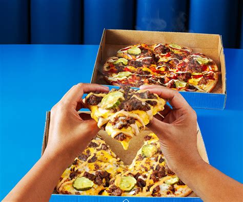 Bun Believable Dominos Rolls Out Pizza Powered Burger Joints Across