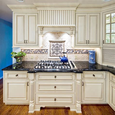 Countertops Idea Redecorating Kitchens Classic Blue And White Kitchen Design With Black Countertop And Artistic Backsplash A Collection Of 14 Blue Kitchen Design Ideas 