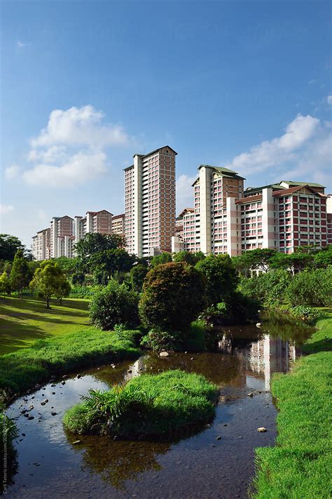Singapore Public Housing In Front Of A Beautiful Park By Stocksy