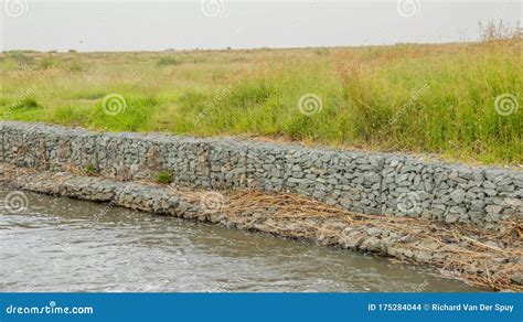 Gabion Retaining Walls On The Bank Of A River Stock Photography