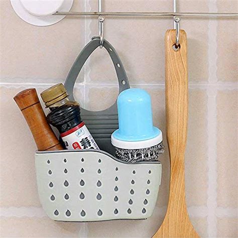A detachable drip tray catches water and includes a pour spout for quick draining. McoMce 2PCS Sink Caddy, Silicone Sponge Holder for Kitchen ...
