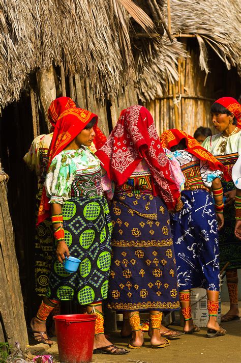 Kuna Indian Women In Native Costume With Mola Embrodery Blouse Fetching Water In The Village