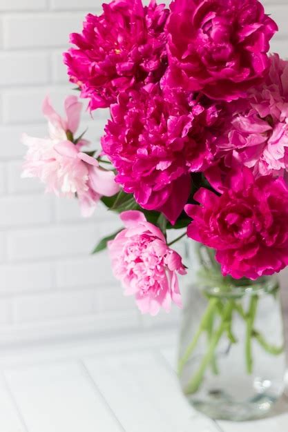 Premium Photo Beautiful Bouquet Of Pink Peonies In The Glass Vase On The Light Gray Brick And