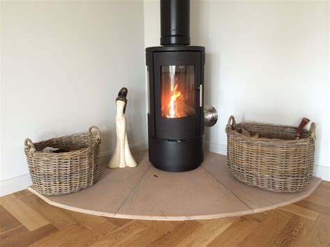 Morso Wood burning stove with external air vent and stone hearth sunk