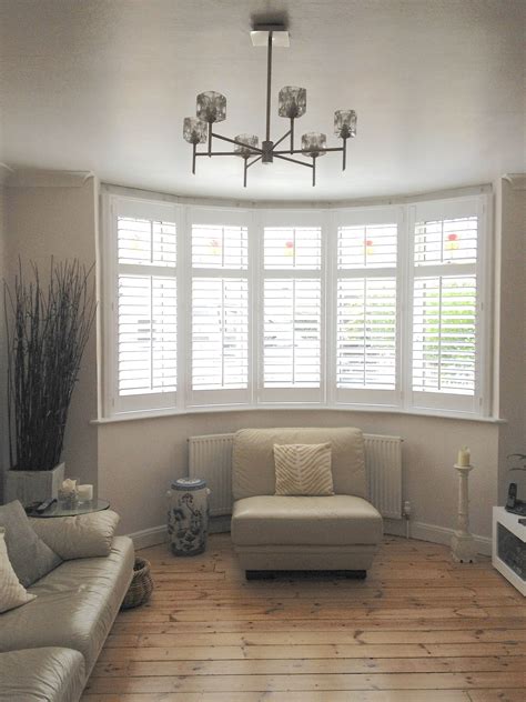 Some Amazing Shutters In A Bay Window Bay Window Living Room Living