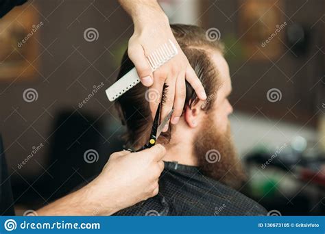Barber Using Scissors And Comb In Barbershop Stock Image Image Of