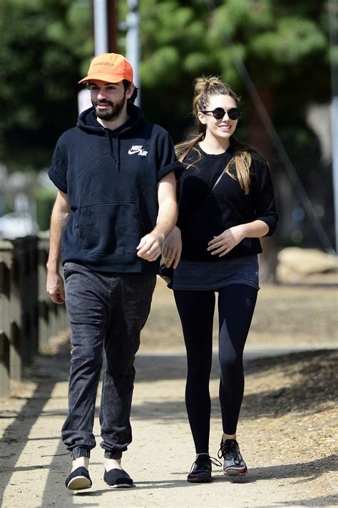 After three years of dating. elizabeth olsen packs on the pda with her musician ...