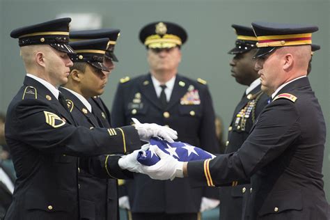 Consolidated id card office online. Member of La. Guard's Military Funeral Honors team ...