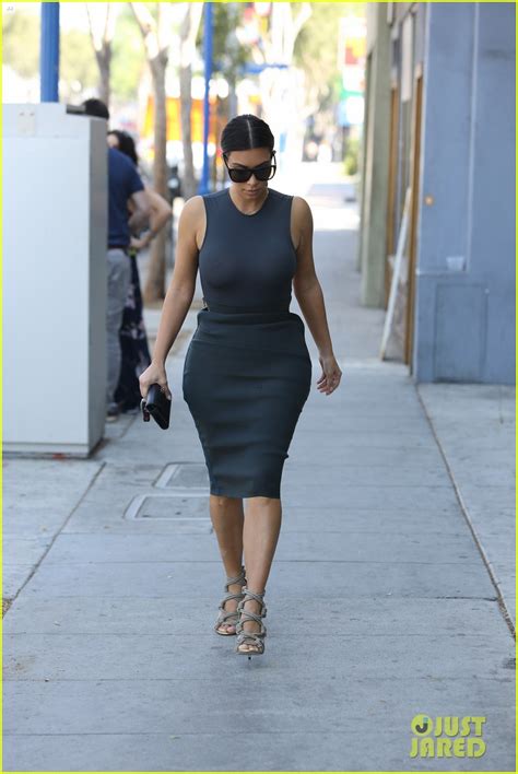 Kim Kardashian Shows Off Her Assets In A Totally Sheer Top Photo