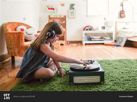 Girl Listening To A Record Player Stock Photo Offset