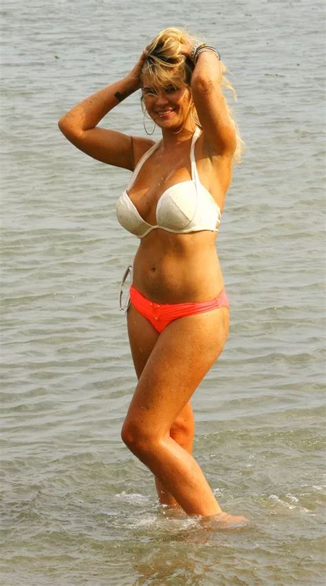 EastEnders Kierston Wareing Shows Off Her Stunning Curves As She Cools Off In The Sea In