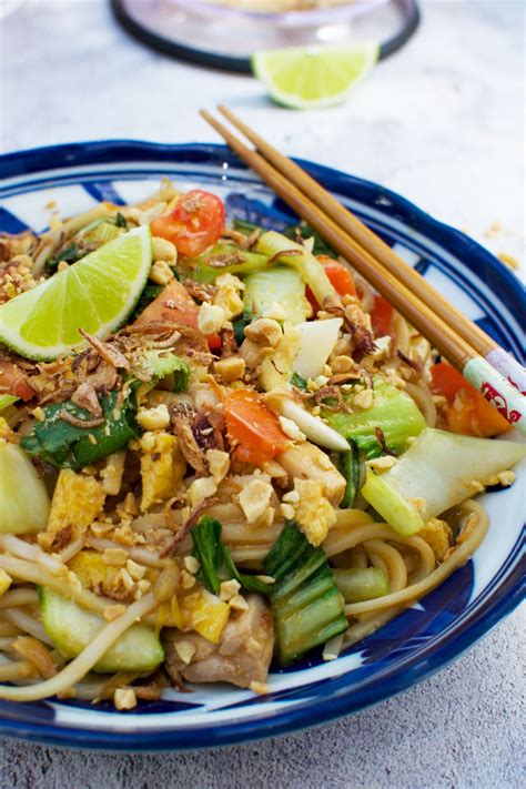 With a sticky, savoury sweet sauce, noodles are tossed with chicken, prawns, vegetables and signature egg ribbons. 30-minute mee goreng basah ('wet' Indonesian noodles ...