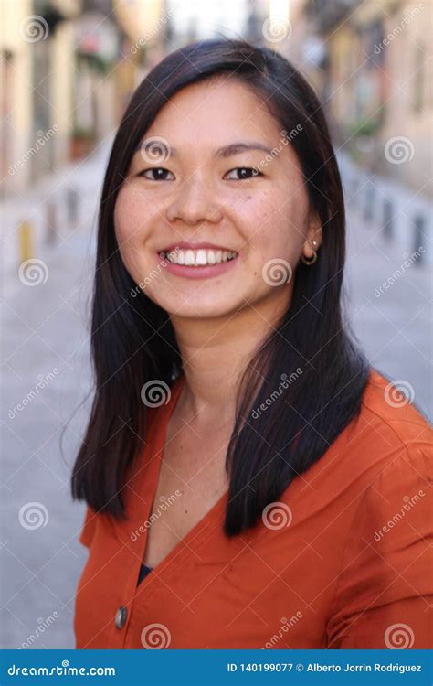 Asian Woman Smiling Outdoors Headshot Stock Image Image Of City Person 140199077