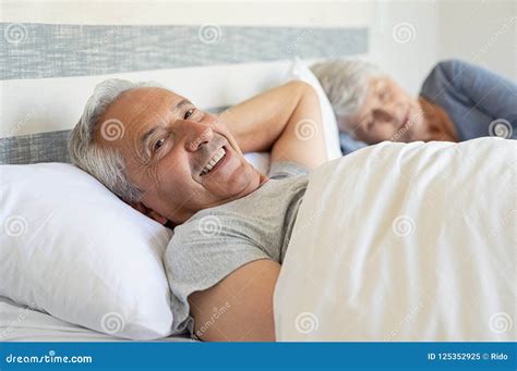 Happy Senior Man Lying On Bed Stock Image Image Of Elderly Pensioner