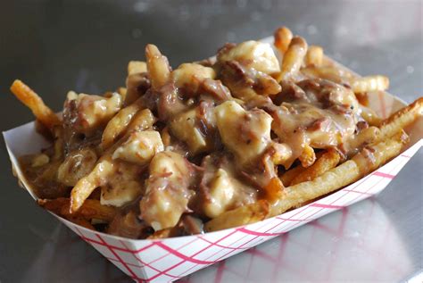 Poutine Fries A Fast Food Dish From French Canada Consisting Of Fries