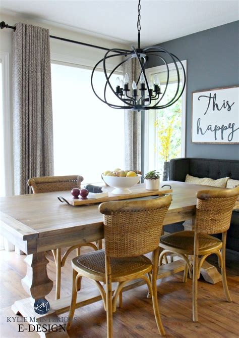 You can combine wooden dining tables with plastic or vintage iron chairs. Farmhouse dining table with wicker chairs, chandelier ...