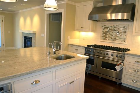 Can anyone recommend a creamy white for kitchen cabinets? Coloring Your World: Pure White Kitchen Cabinets vs. Cream ...