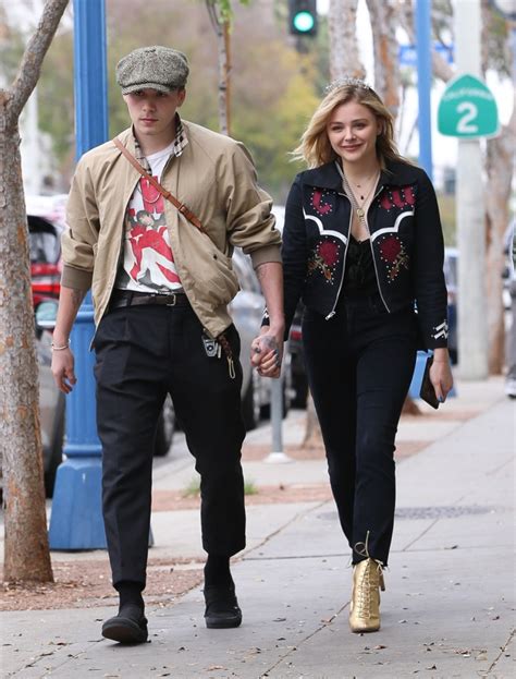 brooklyn beckham and chloe moretz pda photos see their cutest couple moments hollywood life