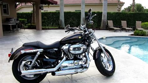 The 1200 custom manages to keep seat height low with the help of a short suspension, giving it just a hair over 2 inches of wheel travel out back. 2013 Harley Davidson XL 1200 Sportster Custom by Advanced ...