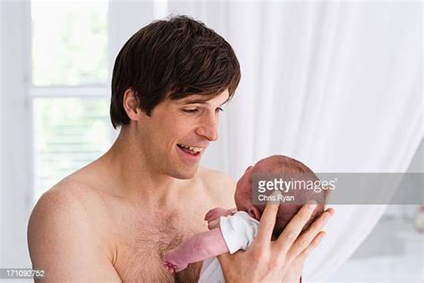 Dad Kissing Baby Chest Photos And Premium High Res Pictures Getty Images