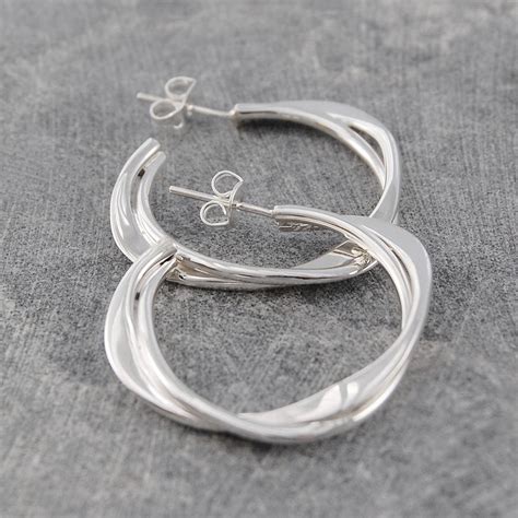Genuine real 925 sterling silver hoop sleeper huggies earrings large small rings. Solid Sterling Silver Interwoven Hoop Earrings By Otis ...
