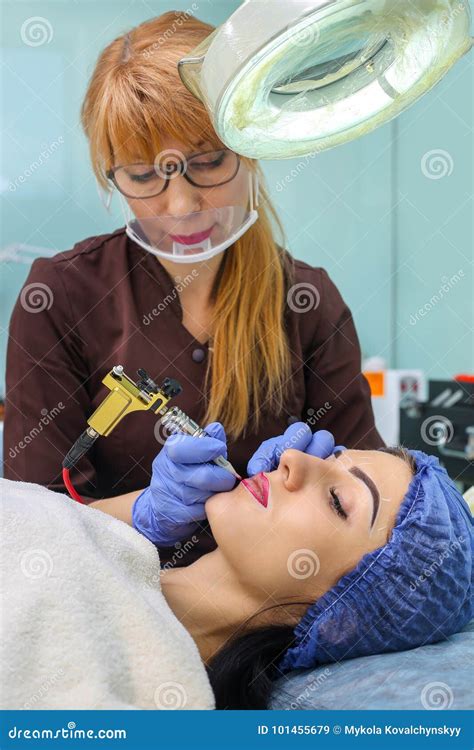 Cosmetologist Making Permanent Makeup On Woman`s Face Stock Image Image Of Care Closeup
