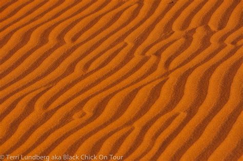 Wavy Sand Patterns Black Chick On Tour