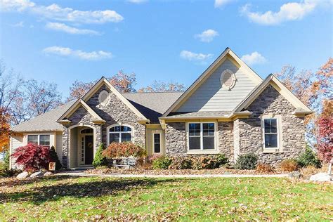 Amazingplans.com offers ranch house plan designs from designers in the united states and canada. Lovely Ranch House Plan with Stone Accents - 770006CED ...