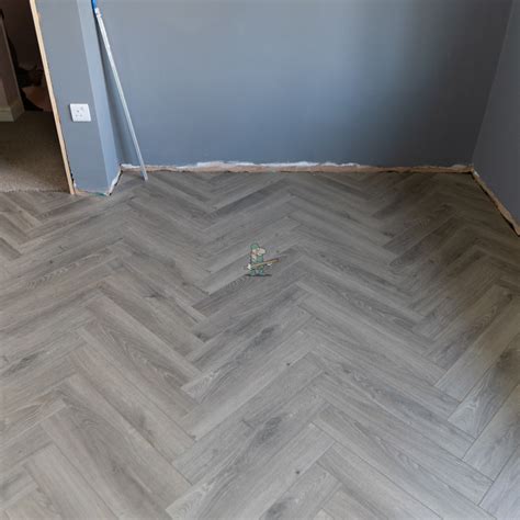 Fusion Herringbone 12mm Moon Grey Oak 4v Laminate Flooring Flooring