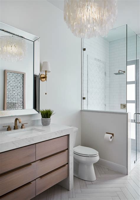 Guest Bath With Shell Chandelier Waterfall Countertop Shell