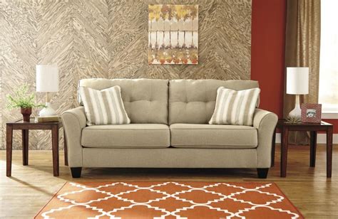 * you can spin the wheel only once. Comfy Sofa in Beige by Ashley Home Furniture ...
