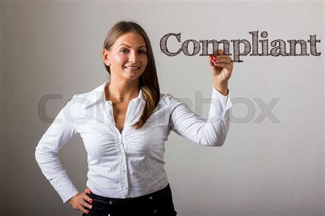 Compliant Beautiful Girl Writing On Transparent Surface Stock Image