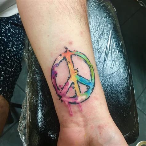The peace sign can be illustrated in a number of different ways. 55+ Best Peace Sign Tattoo Designs - Anti-War Movement ...