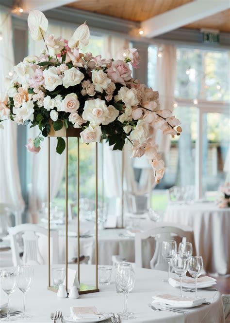 29 Tall Centerpieces That Will Take Your Reception Tables To New Heights Flower Centerpieces