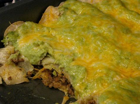 Fold edge nearest filling up and over to cover. Becoming Betty: Green Beef Enchiladas