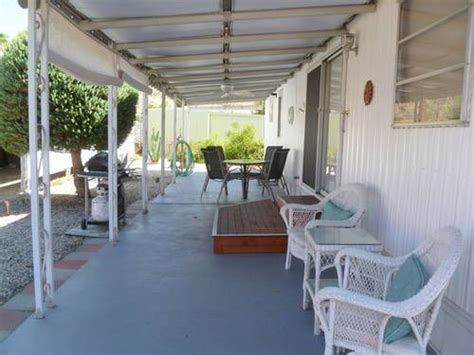 I have searched pinterest for fall front porch ideas and diy. trailer patio-back porch | Mobile home porch, Home porch ...